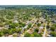 An aerial view of a residential neighborhood with mature trees and well-maintained properties at 1424 W New Hampshire St, Orlando, FL 32804