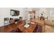 Inviting living room featuring stylish decor, hardwood floors, and an open layout to the dining area at 1424 W New Hampshire St, Orlando, FL 32804