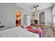 Studio apartment featuring kitchenette, modern ceiling fan, and bright interior paint at 150 Debary Dr, Debary, FL 32713