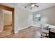 Comfortable bedroom featuring beautiful floors, closet, ceiling fan and a window at 150 Debary Dr, Debary, FL 32713