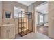 Bright dressing area featuring a wooden rack, window, and sink with vanity at 150 Debary Dr, Debary, FL 32713