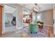 Interior shot through doorway featuring living room, kitchen with updated cabinets and appliances at 150 Debary Dr, Debary, FL 32713