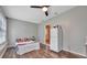 Efficient studio features bed, kitchenette, modern ceiling fan and bright interior paint at 150 Debary Dr, Debary, FL 32713