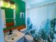 Stylish bathroom with a shower-tub combination, vanity, and botanical-themed decor at 1671 Judith Dr, Kissimmee, FL 34758