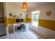 Dedicated home office space featuring tiled floors, a modern desk, and natural lighting at 1671 Judith Dr, Kissimmee, FL 34758