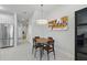 Dining area featuring a modern light fixture and stylish decor at 17349 Serenidad Blvd, Clermont, FL 34714