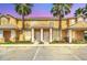 Inviting two-story townhome featuring a landscaped yard and convenient parking at 17349 Serenidad Blvd, Clermont, FL 34714