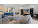 Open-concept living space with kitchen, dining area, and comfortable seating, creating a welcoming atmosphere at 17349 Serenidad Blvd, Clermont, FL 34714