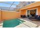 Private plunge pool and patio featuring an outdoor dining and lounge area at 17349 Serenidad Blvd, Clermont, FL 34714