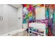 Fun bathroom featuring decorative diamond wallpaper, glass shower and chrome fixtures at 1761 Legion Dr, Winter Park, FL 32789