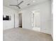 This bedroom has an open layout, and features carpet flooring and a ceiling fan at 1761 Legion Dr, Winter Park, FL 32789