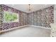 Modern bedroom showcases vibrant wallpaper and updated lighting fixture at 1761 Legion Dr, Winter Park, FL 32789