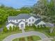 Stunning two-story home with manicured landscaping, circular driveway and grand entrance at 1761 Legion Dr, Winter Park, FL 32789