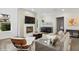 Open living area featuring a fireplace, modern seating, and stylish decorative elements at 1761 Legion Dr, Winter Park, FL 32789