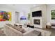 Cozy living room with a fireplace, comfortable seating, and stylish decor at 1761 Legion Dr, Winter Park, FL 32789
