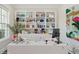 Bright office space featuring a large desk, built-in shelving, and ample natural light at 1761 Legion Dr, Winter Park, FL 32789