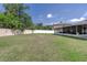 Wide backyard with screened-in porch and privacy fence offers great space for Gathering gatherings at 177 Bristol Forest Trl, Sanford, FL 32771
