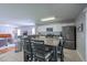 Modern eat-in kitchen with stainless steel appliances and an island with seating at 177 Bristol Forest Trl, Sanford, FL 32771