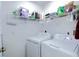 Clean laundry room with modern washer and dryer at 177 Bristol Forest Trl, Sanford, FL 32771