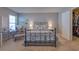 The main bedroom features a decorative color scheme, comfortable furniture, and a large window at 177 Bristol Forest Trl, Sanford, FL 32771