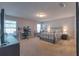 The primary bedroom features a work area, large windows, and a comfortable bed at 177 Bristol Forest Trl, Sanford, FL 32771