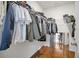 Walk-in closet with ample hanging space and wire shelving for organization at 1866 Cassidy Knoll Dr, Kissimmee, FL 34744