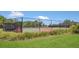 Community tennis courts are surrounded by lush greenery and offer a fun activity at 1866 Cassidy Knoll Dr, Kissimmee, FL 34744