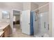 Neutral bathroom features a shower stall with glass doors and tile floors at 1868 Rachels Ridge Loop # L, Ocoee, FL 34761