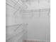 Walk in closet with metal shelving for maximum storage at 1868 Rachels Ridge Loop # L, Ocoee, FL 34761