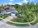 Charming single-story home with well-maintained lawn and landscaping on a bright day with blue skies and some clouds at 1868 Rachels Ridge Loop # L, Ocoee, FL 34761
