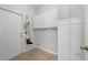 This laundry room features tile floors and cabinets for storage at 1868 Rachels Ridge Loop # L, Ocoee, FL 34761
