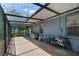 Screened patio provides shade and fresh air, perfect for outdoor relaxation at 1868 Rachels Ridge Loop # L, Ocoee, FL 34761