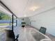 Spacious covered patio with neutral tones, overlooking backyard at 1901 Rose Blvd, Orlando, FL 32839