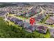 Serene aerial view showing the home's location within a quiet neighborhood surrounded by lush greenery at 2167 Pearl Cider St, Orlando, FL 32824