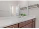Bathroom showcasing a white vanity with an undermount sink, a large mirror, and silver fixtures at 2167 Pearl Cider St, Orlando, FL 32824