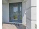 Elegant front door with decorative glass panels enhances the home's curb appeal at 2167 Pearl Cider St, Orlando, FL 32824