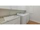 Laundry room features granite countertops, a large sink, and washer dryer at 2167 Pearl Cider St, Orlando, FL 32824