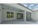 Covered patio featuring Adirondack chairs, a ceiling fan, and string lights for relaxing outdoor living at 2167 Pearl Cider St, Orlando, FL 32824