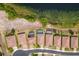 A bird's-eye view showcases homes with tile roofs near a lake, highlighting privacy and community layout at 2173 Lake Side Ave, Davenport, FL 33837