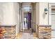 Inviting home entrance with a stylish door and decorative stone accents on the exterior at 2173 Lake Side Ave, Davenport, FL 33837