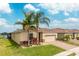 Beautiful single-story home featuring a paver driveway and a lush lawn at 2173 Lake Side Ave, Davenport, FL 33837