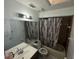 Full bathroom with a shower and bathtub, offering a functional and clean space at 2212 Atrium Cir, Orlando, FL 32808