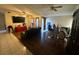 Inviting living room featuring a combination of tile and wooden flooring at 2212 Atrium Cir, Orlando, FL 32808
