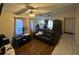 Comfortable living room area with hardwood flooring, offering a relaxing space at 2212 Atrium Cir, Orlando, FL 32808