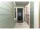 Apartment exterior featuring a dark door and decorative brick accents at 2214 Metropolitan Way # 1032, Orlando, FL 32839