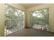 Corner balcony with tree views overlooking the parking area at 2214 Metropolitan Way # 1032, Orlando, FL 32839