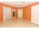 Bedroom leading to walk-in closet and en-suite bathroom with natural light at 2214 Metropolitan Way # 1032, Orlando, FL 32839