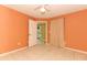 Bedroom with tile flooring, ceiling fan, and natural light at 2214 Metropolitan Way # 1032, Orlando, FL 32839