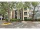 Attractive apartment building featuring multiple stories, exterior stairs, and handicap parking at 2214 Metropolitan Way # 1032, Orlando, FL 32839