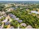 Sprawling neighborhood surrounded by mature trees and multiple ponds with golf course nearby at 224 Bluestone Pl, Casselberry, FL 32707